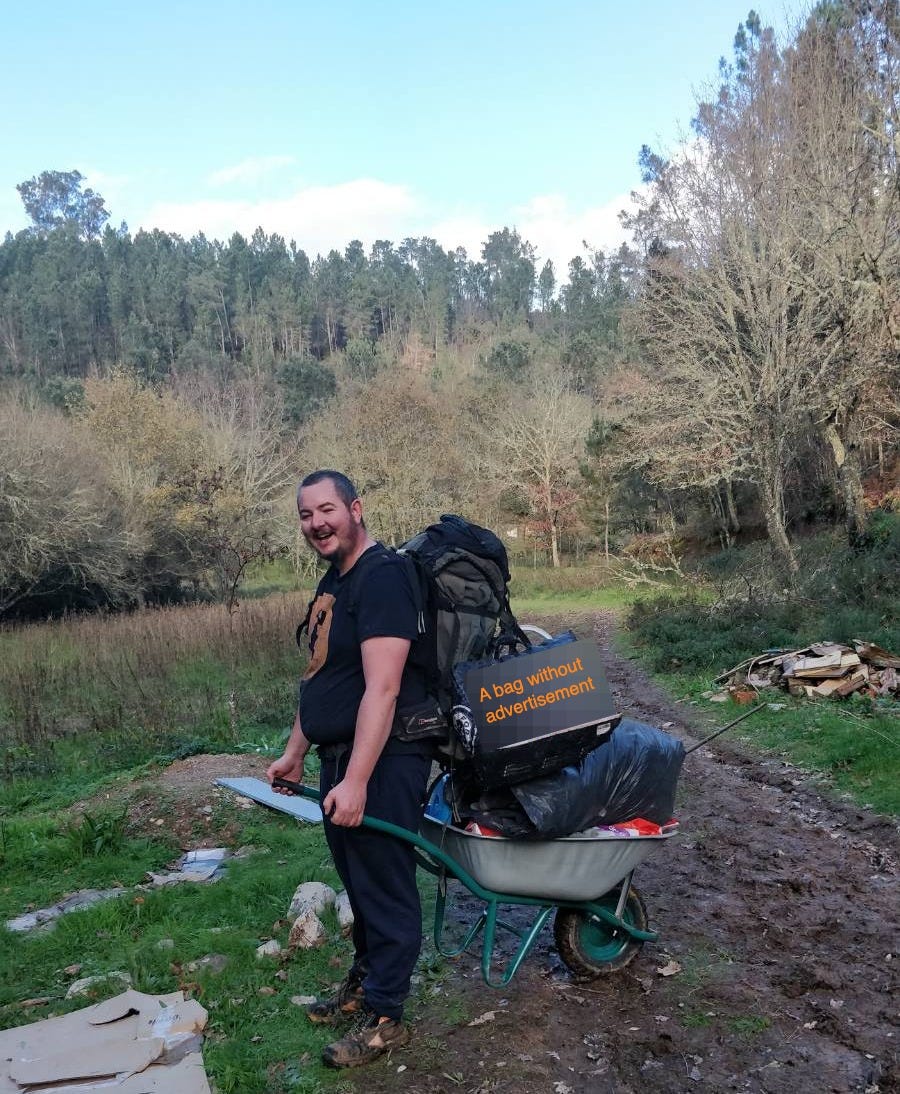 Photo of author holding wheelbarrow