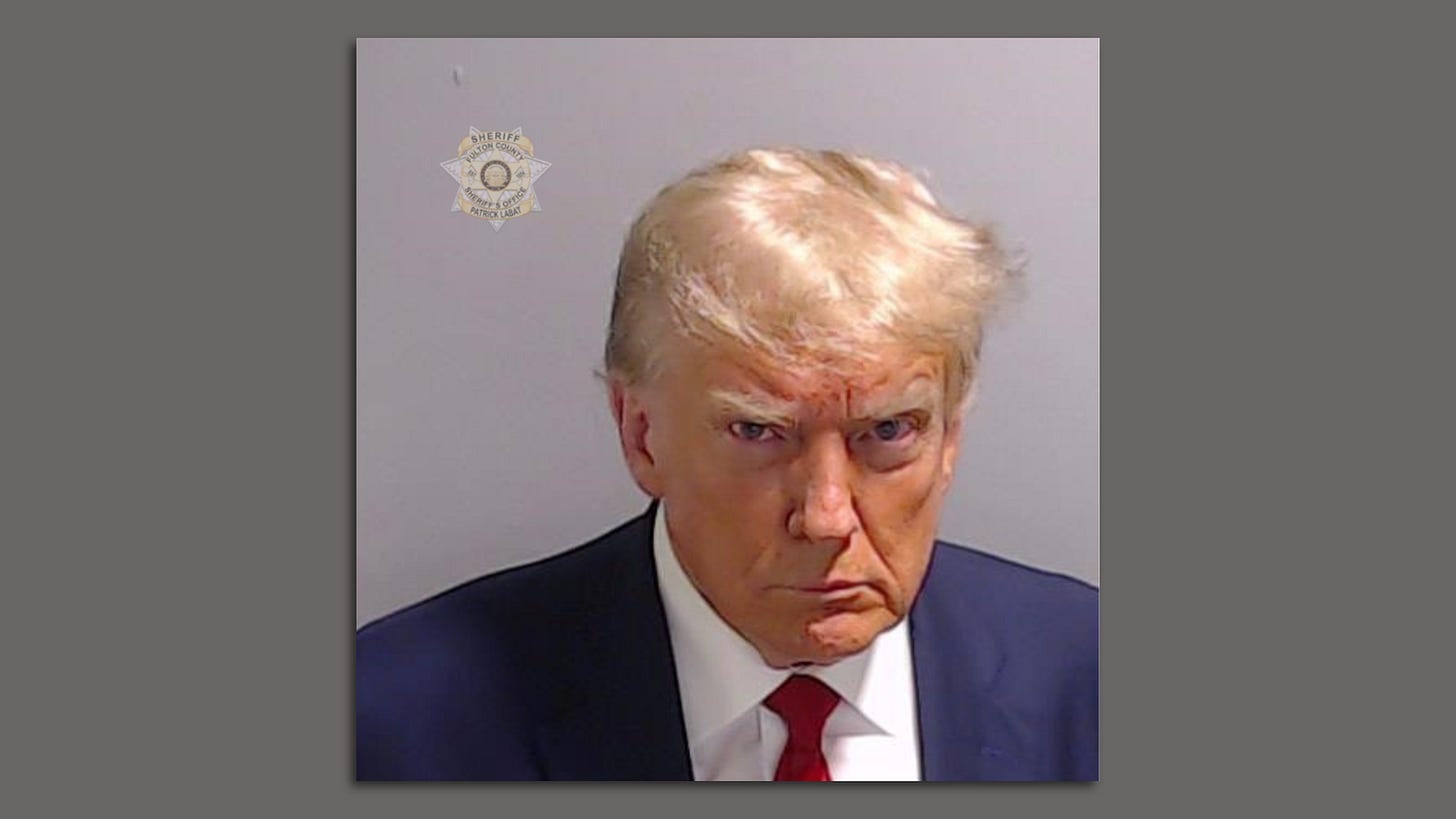 Donald Trump surrenders at Atlanta's Fulton County jail, has mug shot taken  - Axios Atlanta