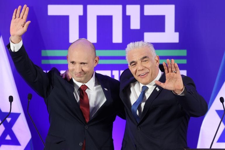 epa12915798 Former Israeli prime ministers Naftali Bennett (L) and Yair Lapid (R) hold a joint press conference in Herzliya, Israel, 26 April 2026. The two leaders announced they will run together in the upcoming general elections under a new unified party called 'Together'. Israel's general elections are scheduled for 27 October 2026. EPA/ABIR SULTAN