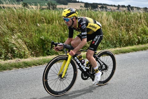 Visma-Lease a Bike’s rider Simon Yates cycles to catch up with the peloton after suffering a mechanical malfunction during the first stage of the Tour de France 2025.