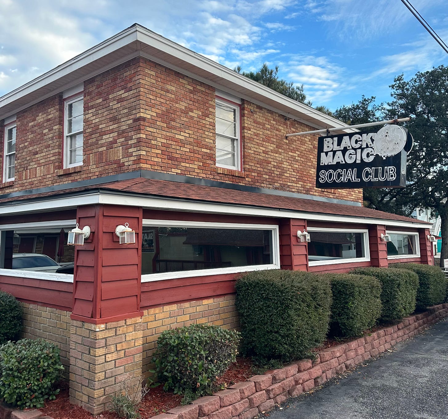 Black Magic Social Club, across the street from DeWitt Rooms. Author photograph, December 2023