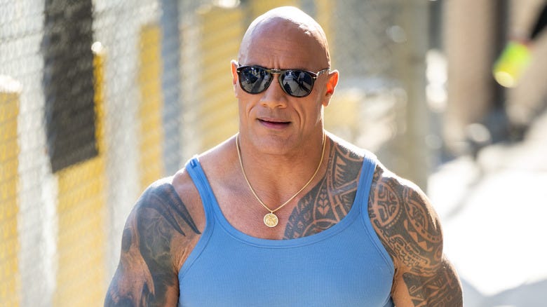 The Rock Pictured Walking Down The Street