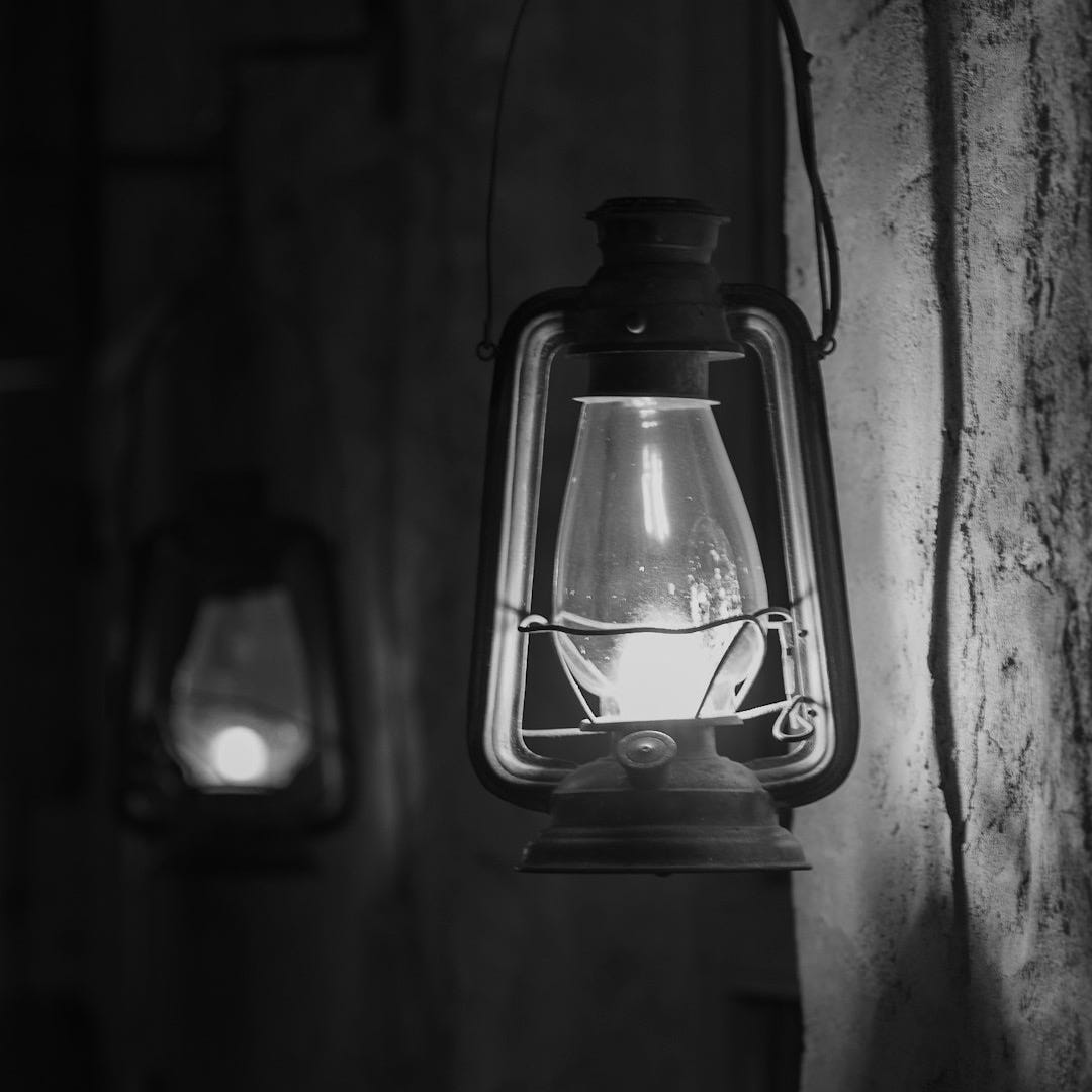 A black and white photo of a lantern
