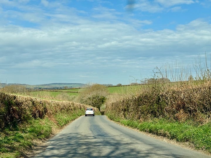 Driving down the Devon lanes until you see this sign at the front of the garden.