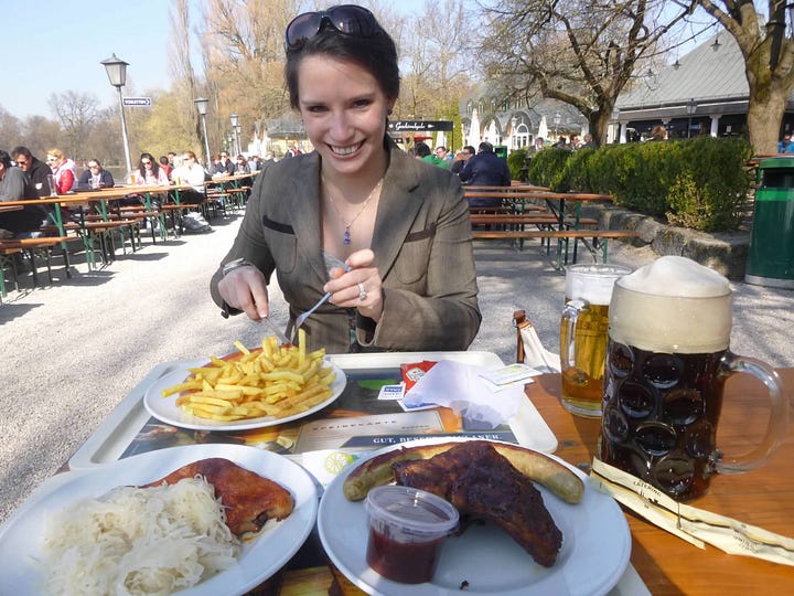Pictures of the author eating German food and drinking a big lager