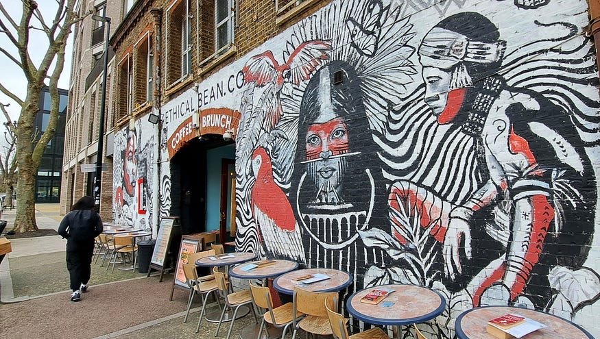 An organic cafe with street art on the outside walls in east London An organic cafe with street art on the outside walls in east London
