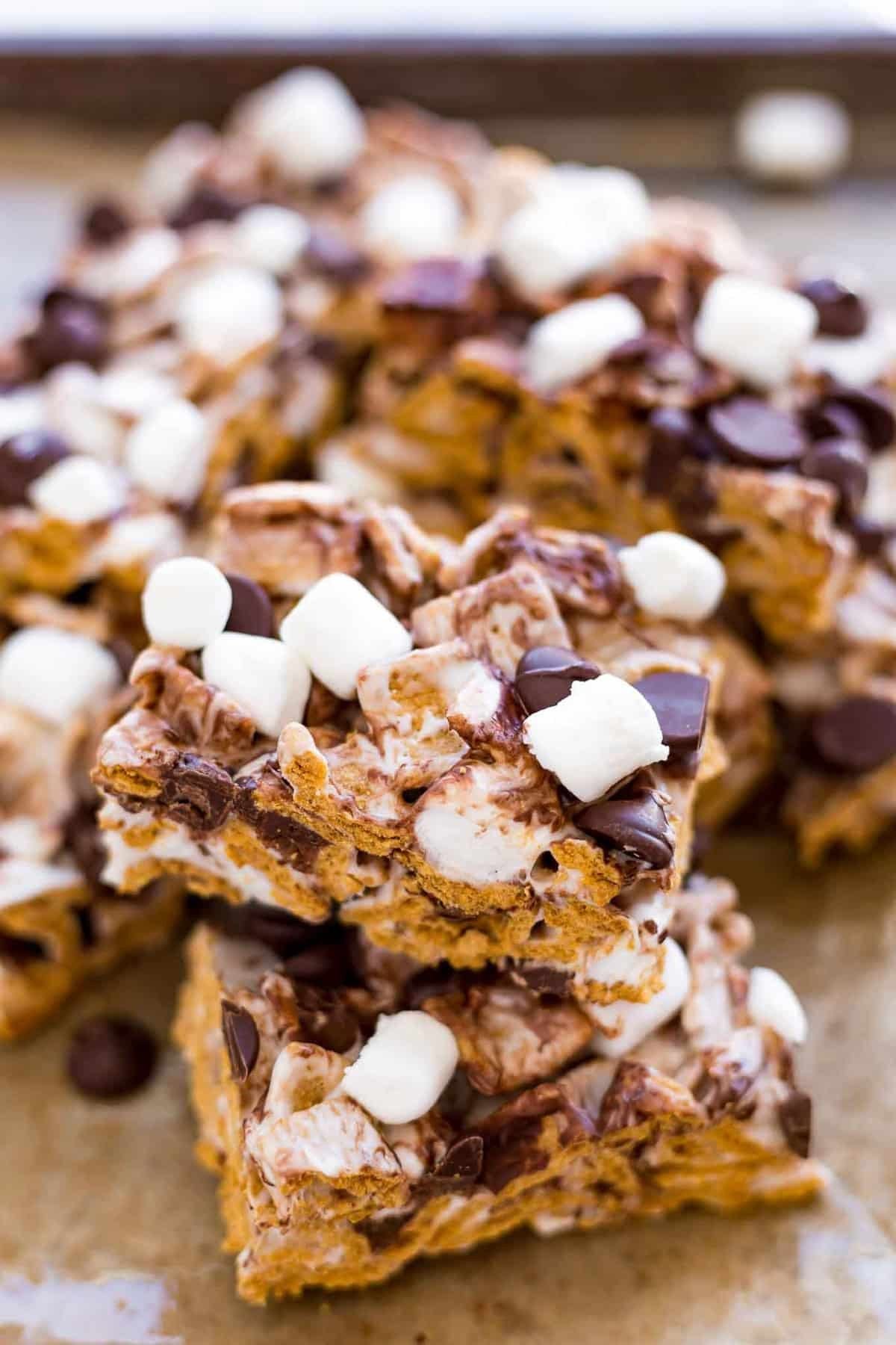 A pile of s'mores bars stacked on tops of each other.