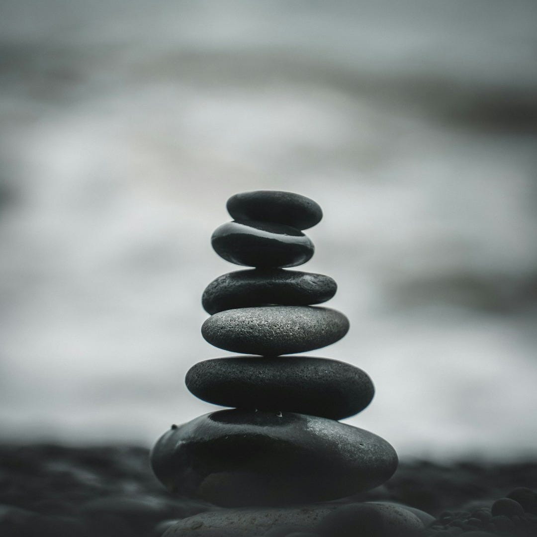 selective focus photography of pile of decorative stones