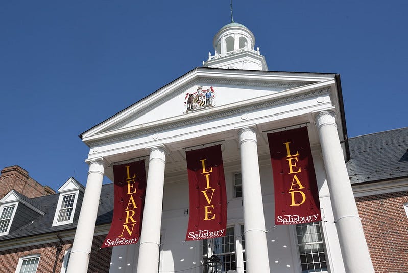 Salisbury University building adorned with a banners stating "Learn Live Lead." Salisbury University building adorned with a banners stating "Learn Live Lead."