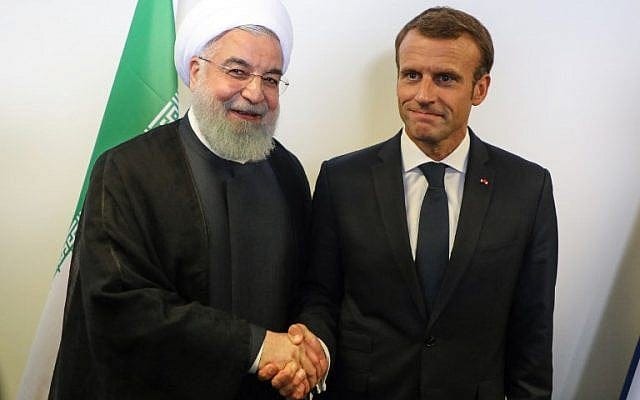 French President Emmanuel Macron (right) with Iranian President Hassan Rouhani on the sidelines of the UN General Assembly at the UN headquarters on September 25, 2018, in New York. (AFP Photo/ludovic Marin)