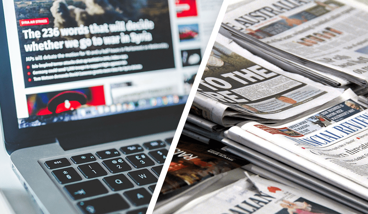 A side-by-side of a news story pulled up on a laptop screen next to stacks of print newspapers