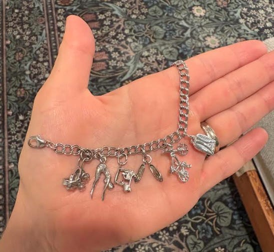 Now every year, on her birthday, I get her a charm that represents the previous year.
