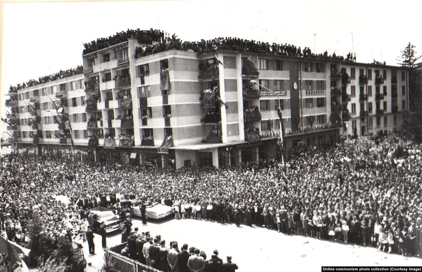 Crowds gather upon Nicolae Ceausescu's arrival in Pitesti, near Bucharest, in 1966. The photo was taken a year after the former shoemaking apprentice rose to power in Romania.
