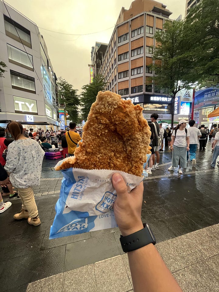 on the left, image of chicken leg sausage, on the right, image of fried chicken cutlet against ximending backdrop