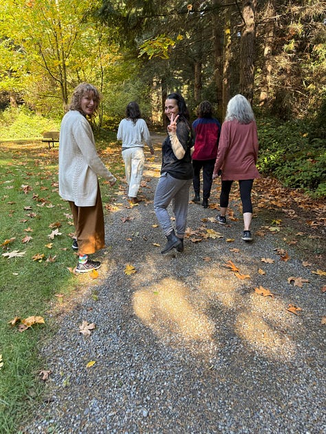 pictures of several women writers in residence at hedgebrook, either walking through the woods or gathered around a bookcase