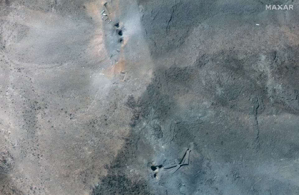 Satellite view of holes at the Fordow underground complex.