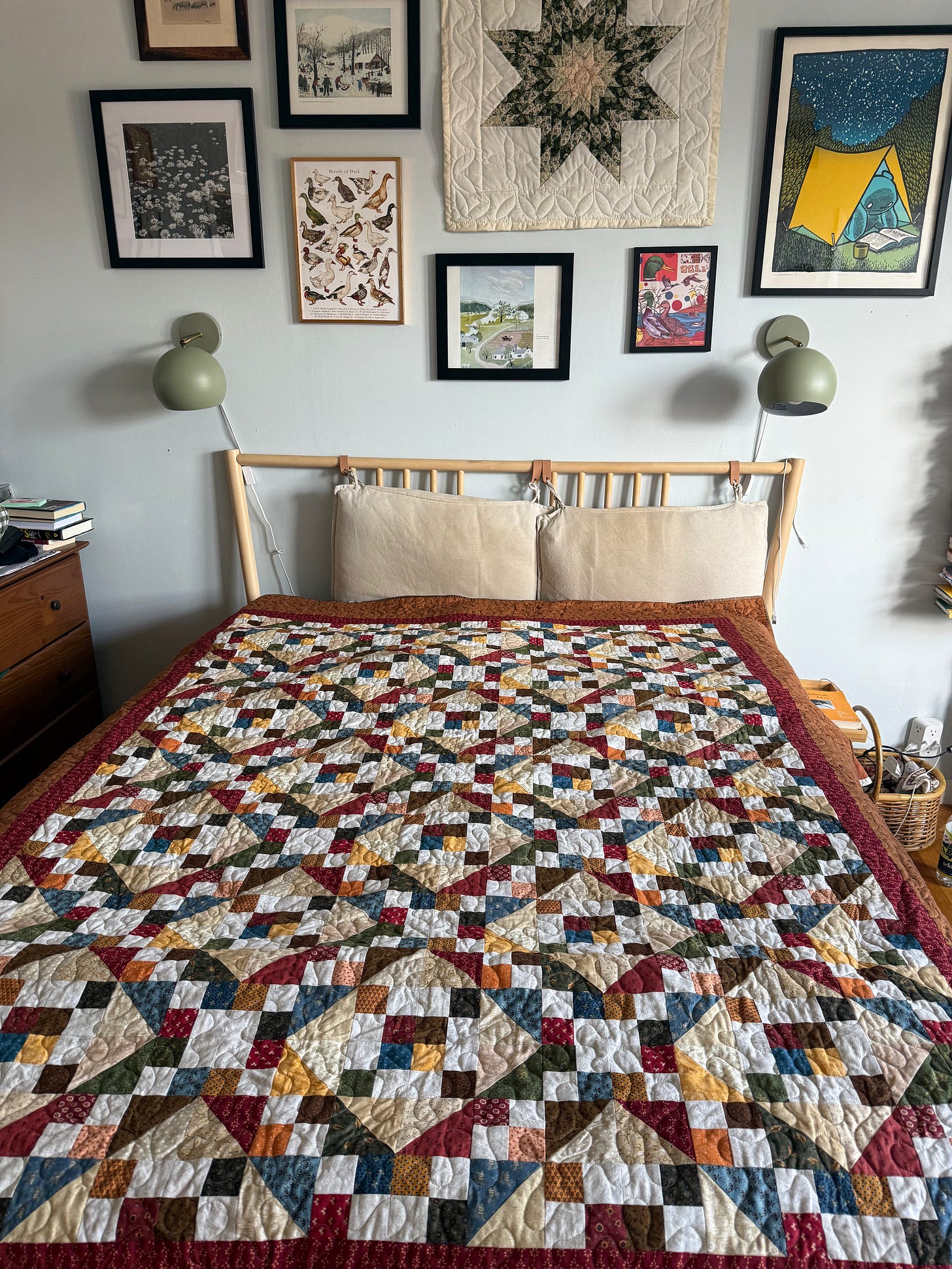 Handmade quilt covering a bed Handmade quilt covering a bed