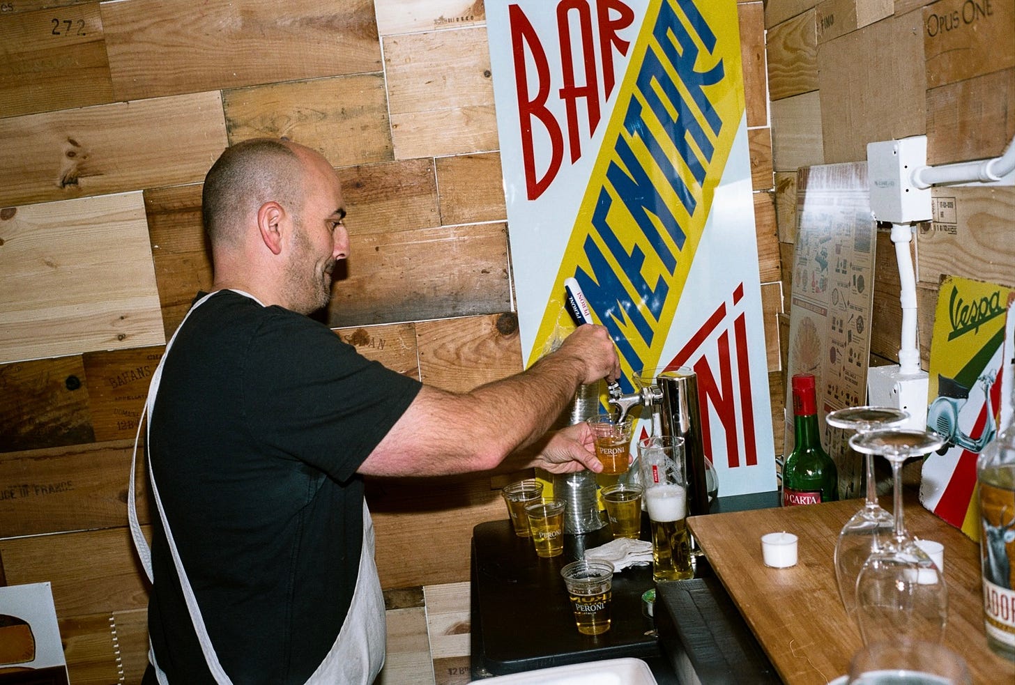 DiBartolomeo pours a Peroni on tap