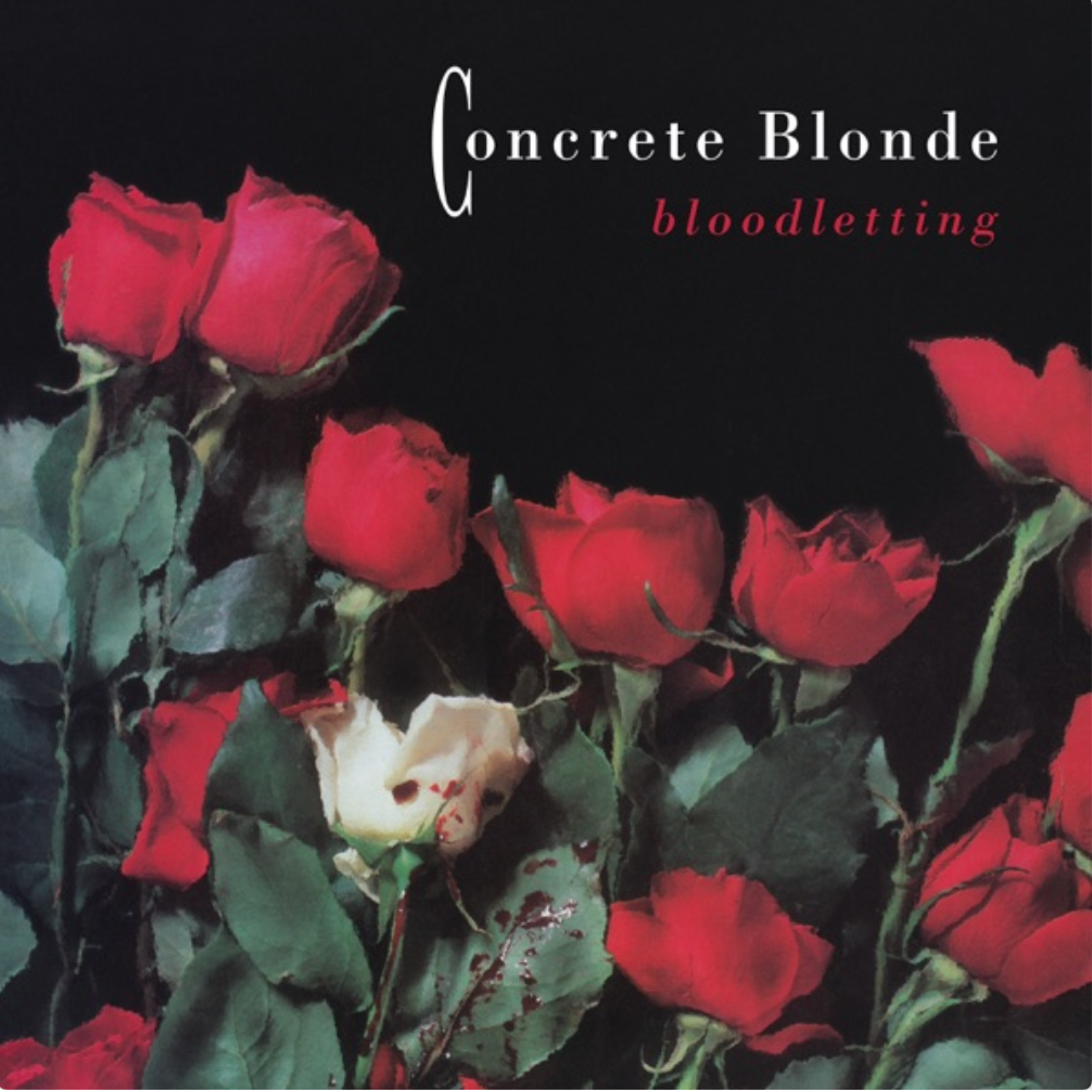 cover of bloodletting album; cover image is red roses, and one white one with what looks like bloodstains cover of bloodletting album; cover image is red roses, and one white one with what looks like bloodstains