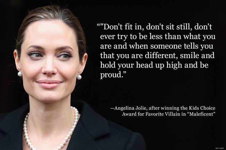 This may contain: a woman in a black jacket and pearls smiles at the camera with a quote about her