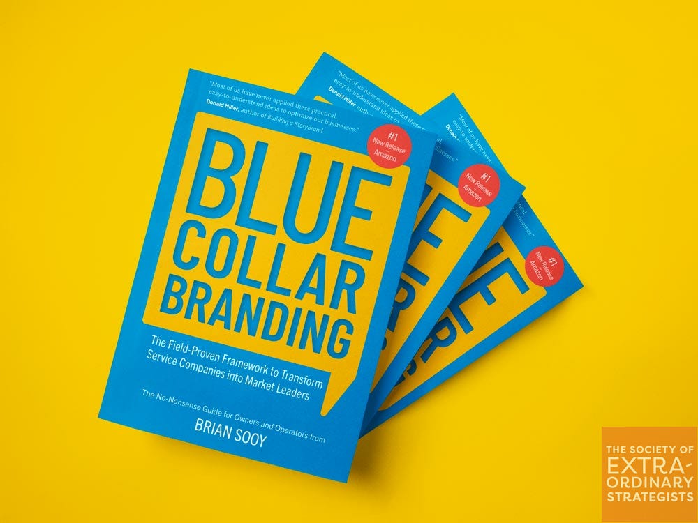 Stack of books "Blue Collar Branding: The Field-Proven Framework to Transform Service Companies into Market Leaders"