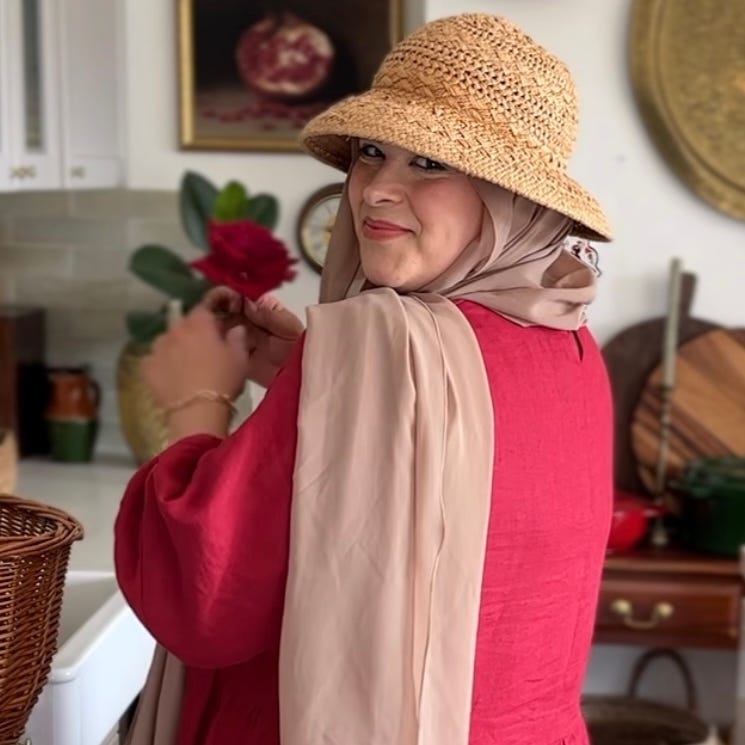 Rooted by Nelly logo