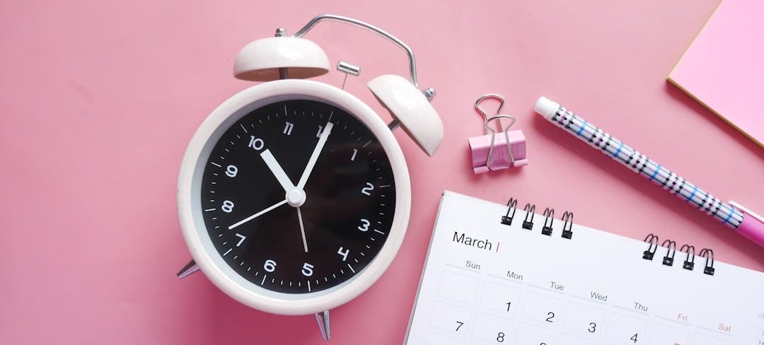white and pink analog alarm clock white and pink analog alarm clock