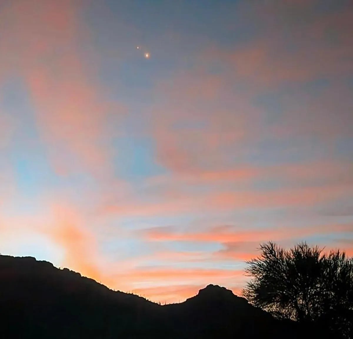 Gordon Moyer used an Android smartphone to capture this view of Venus and Jupiter in the dawn twilight over the the Tucson Mountain Range, Tucson, Arizona, USA, 12 August 2025, 05:10 local time