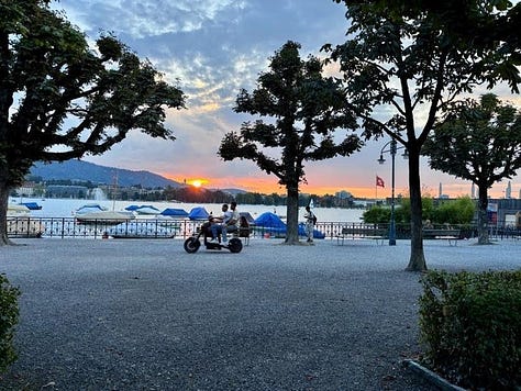 views around Zurich: lakeside sunset, a walk along Limmat River, the ZHB