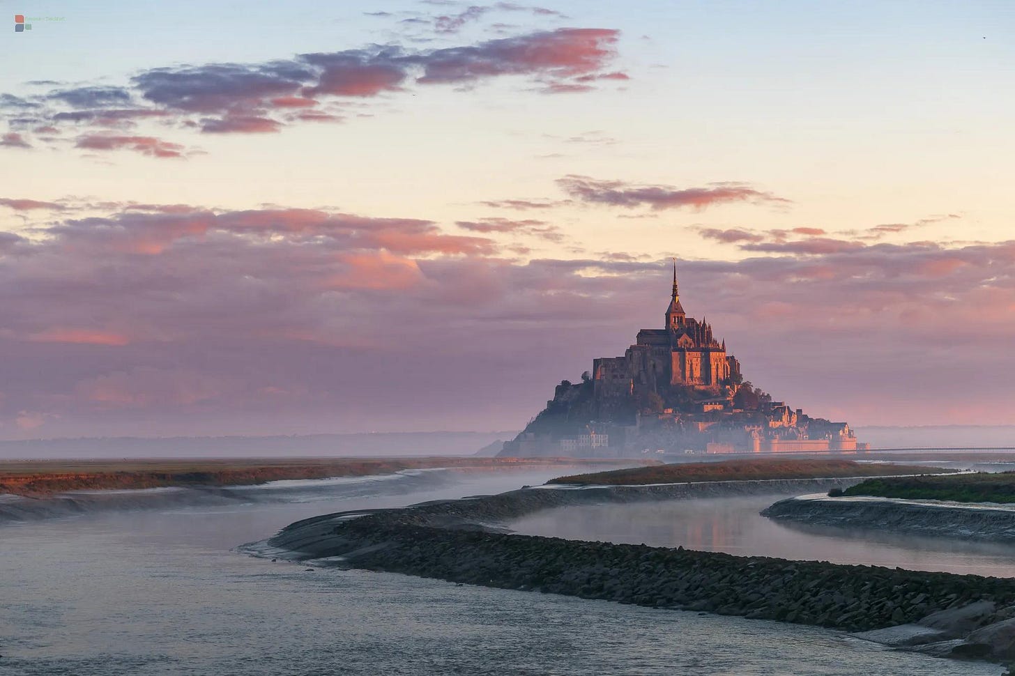 Mont Saint-Michel with mist and low tide