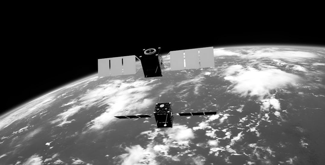 a satellite satellite flying over the earth a satellite satellite flying over the earth