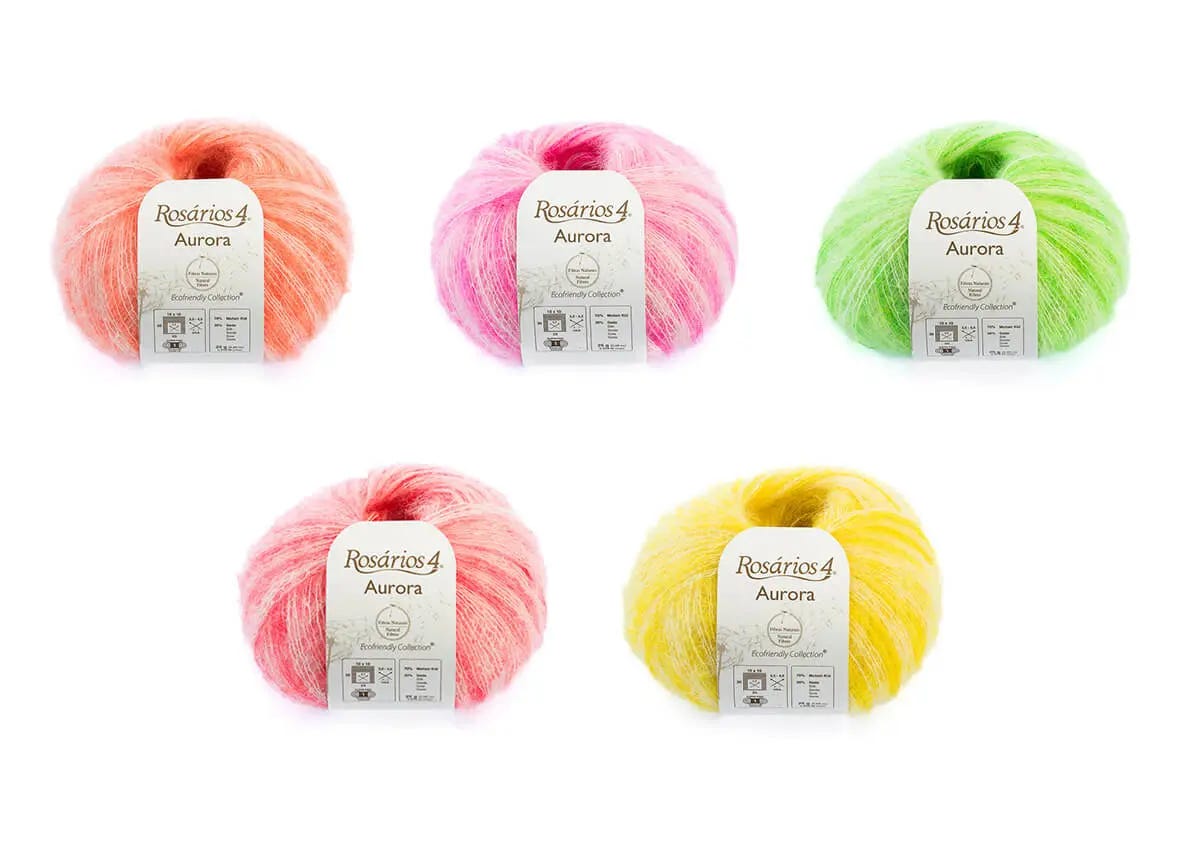 5 yarn balls clockwise from top left: neon orange, neon pink, lime green, yellow, and coral.