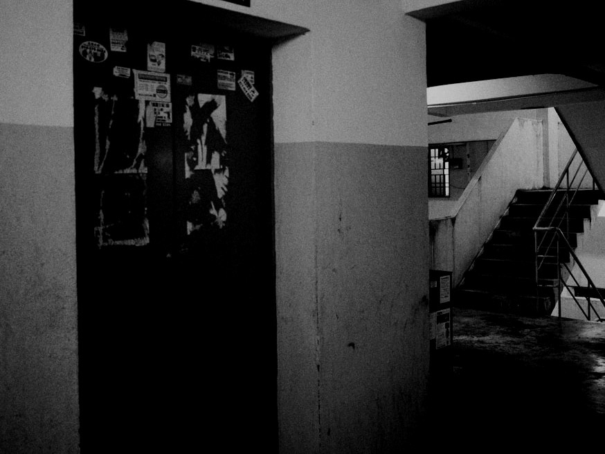 a hallway with a staircase