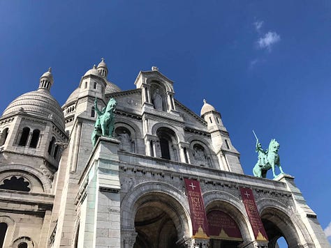 The author's pictures at the Louvre, Montremarte, Moulin rouge, and some city views