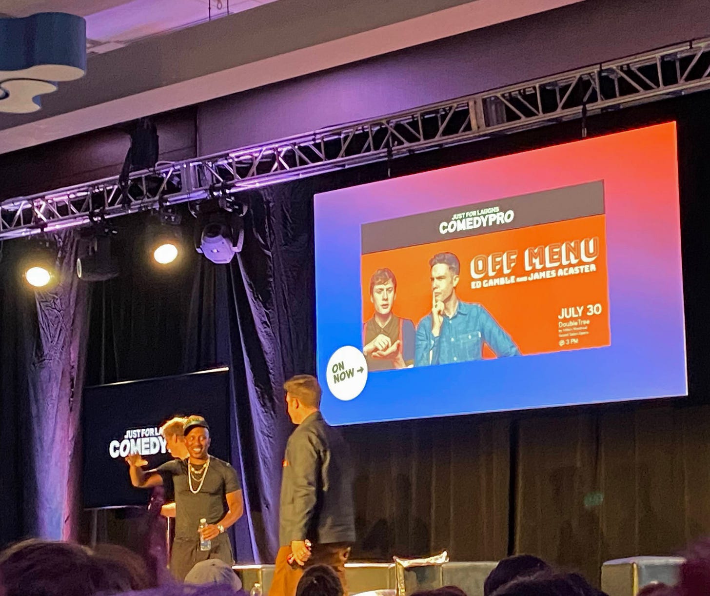 Off Menu podcast being taped on stage.