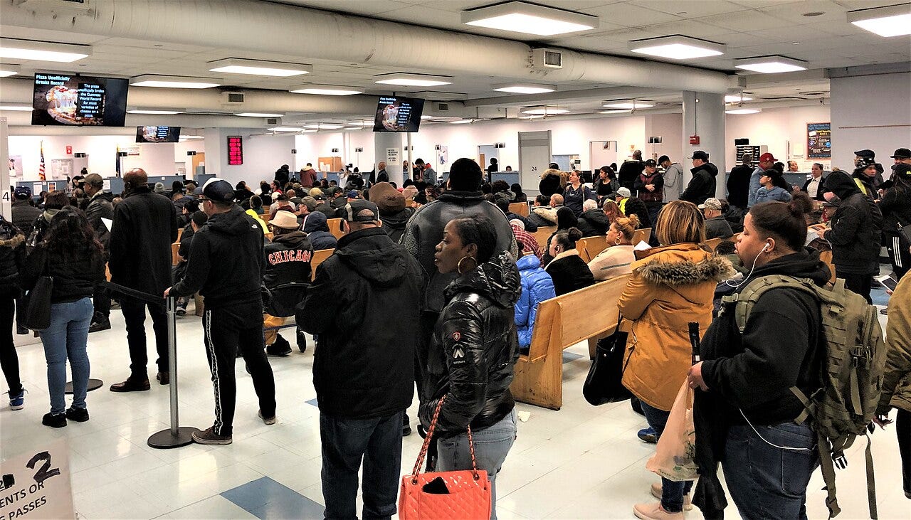 People waiting inside the New York State Department of Motor Vehicles office on East Fordham Road in the Bronx. People waiting inside the New York State Department of Motor Vehicles office on East Fordham Road in the Bronx.