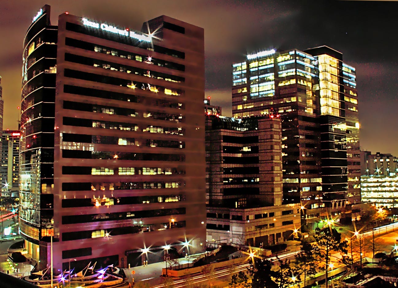 Nighttime photo of the Texas Children's Hospital complex in Houston