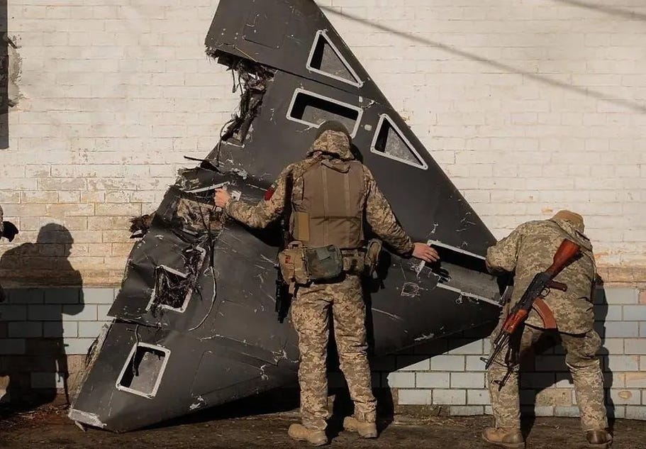 Ukrainian personnel examining a downed Shahed-136/Geran-2. The Shahed-136 is not a small uncrewed aircraft. Ukrainian personnel examining a downed Shahed-136/Geran-2. The Shahed-136 is not a small uncrewed aircraft.