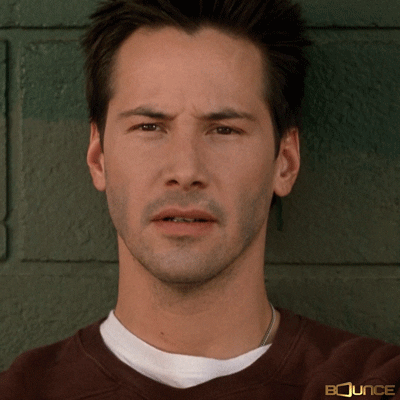 Celebrity gif. Keanu Reeves leans against a brick wall. He furrows his eyebrows, tilts his head, and blinks in utter confusion. Celebrity gif. Keanu Reeves leans against a brick wall. He furrows his eyebrows, tilts his head, and blinks in utter confusion.