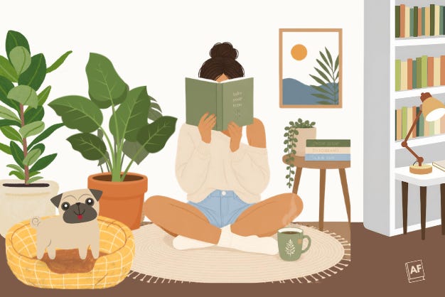 A woman reading a book at home