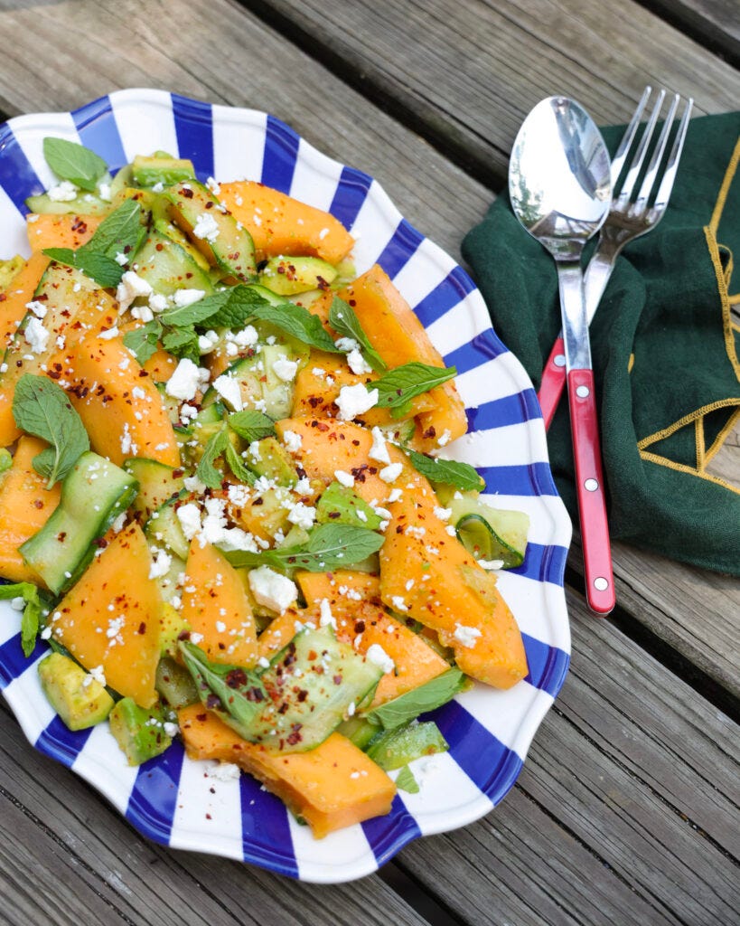 cucumber melon salad topped with mint and feta.