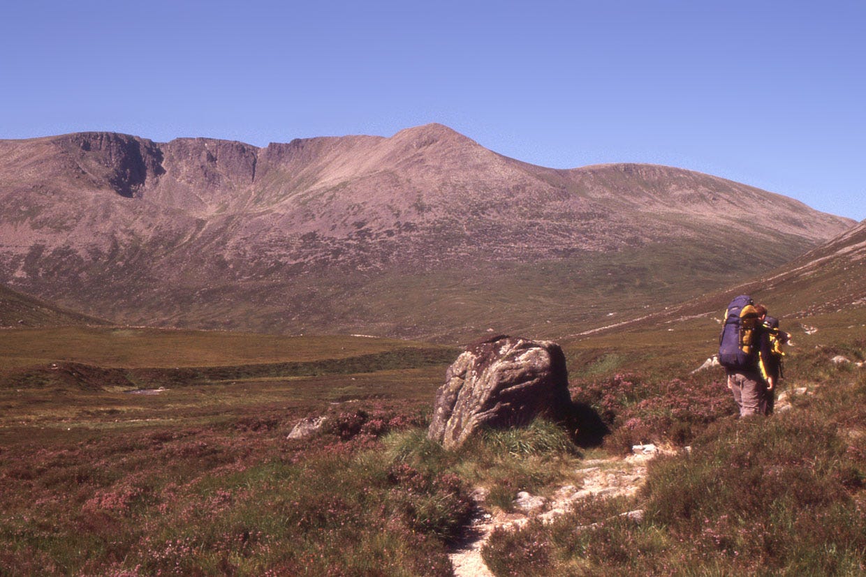 rocky corrie above wide valley, boulder, stony path