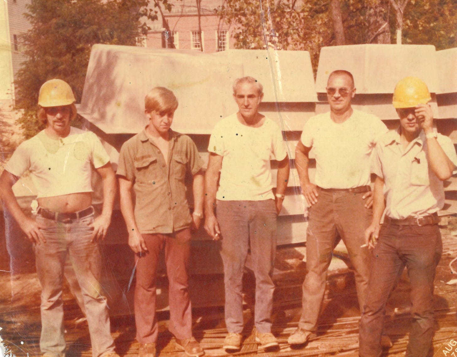 five Hutter Construction workers