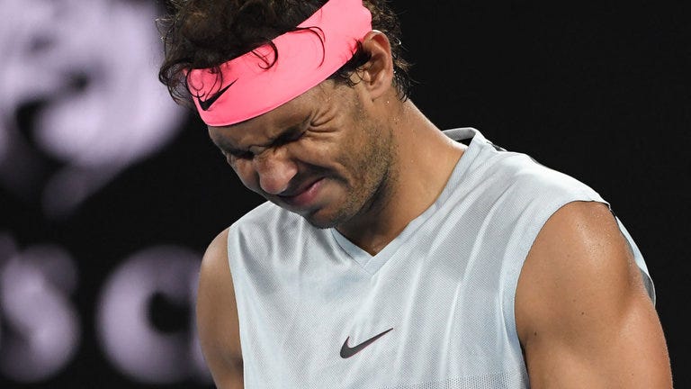 rafael nadal out for two week with inner hip injury australian open 2018