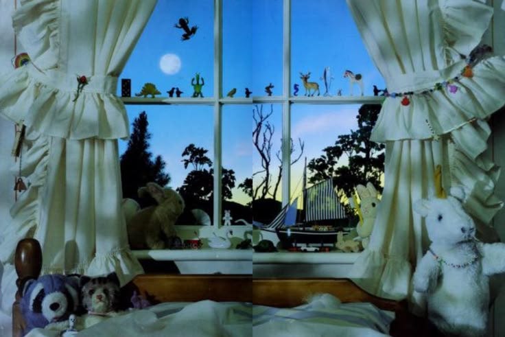 This may contain: there are stuffed animals sitting on the window sill in front of the windowsill