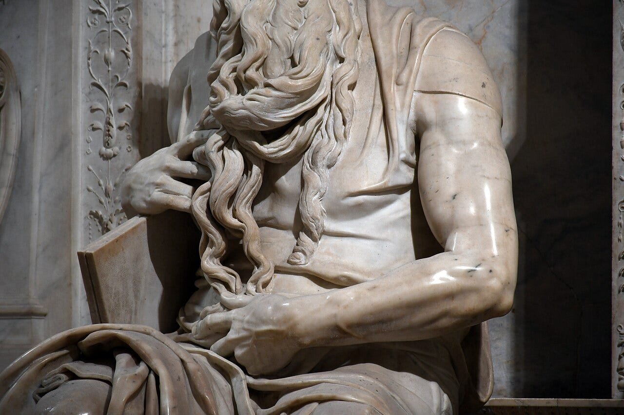 Horned Moses seated statue