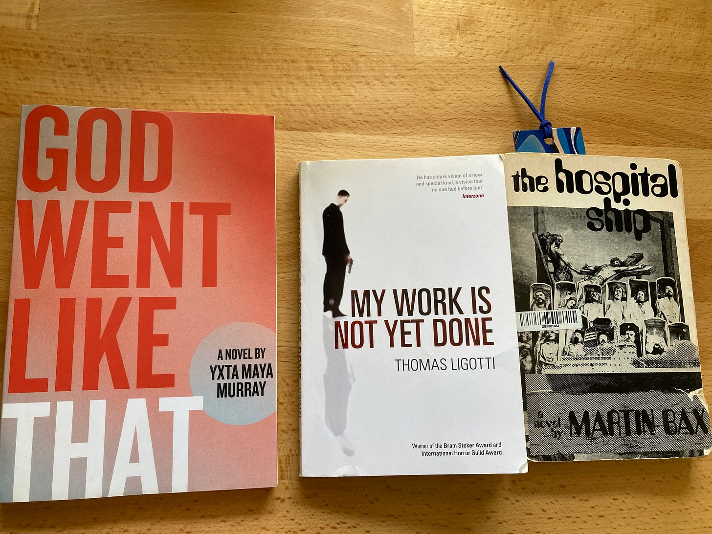 photos of the covers of three books: Murray, Ligotti, Bax