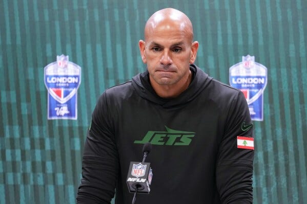 Robert Saleh talking to reporters after Jets-Vikings in London last season 