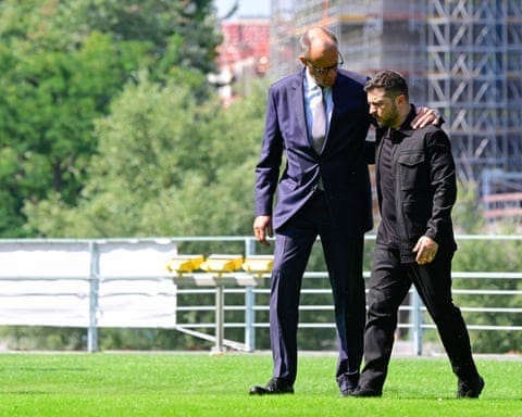 Ukrainian president Volodymyr Zelenskyy, rightt, is welcomed by German chancellor Friedrich Merz upon arrival in the garden of the chancellery in Berlin, Germany.