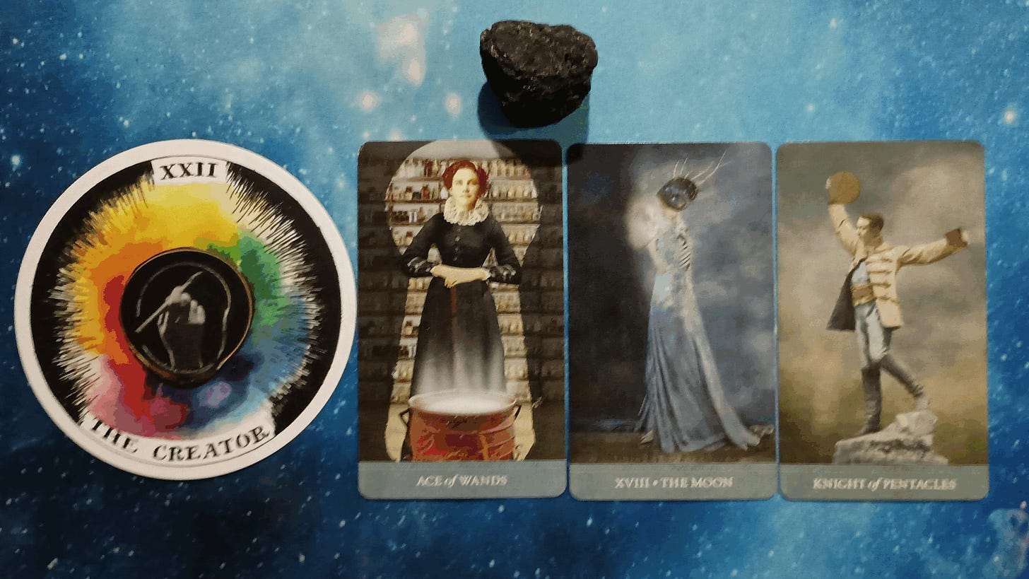 New Moon Pick-a-Card Tarot Reading for June 2025, pile 4 - Black Tourmaline stone and 4 cards on a starry blue background